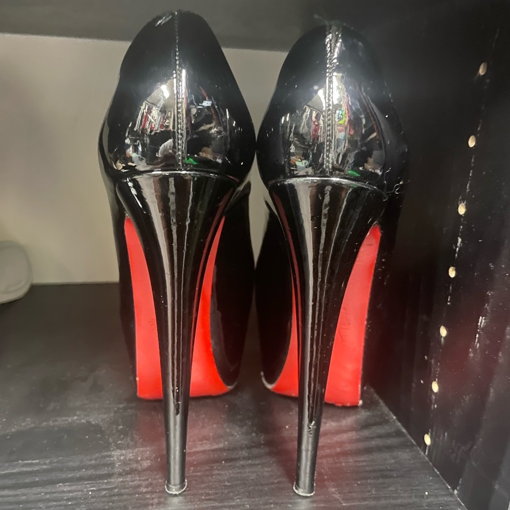 Christian Louboutin
Dolly  Red Sole Platform Pumps